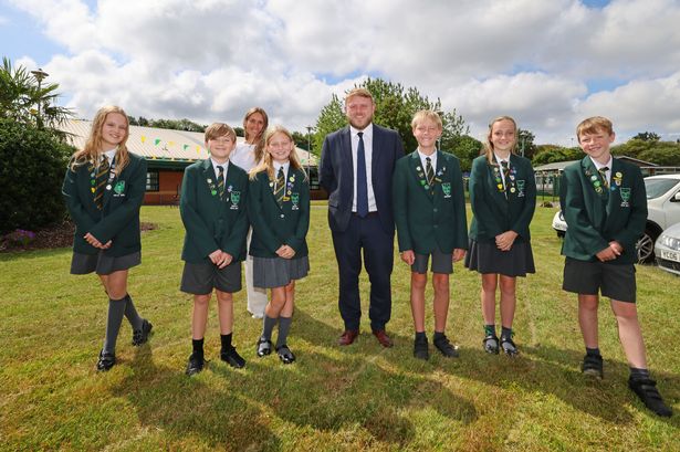 Malvern Primary School, Huyton pictured Headteacher Tony James and Deputy Headteacher Natalie McGorian with pupils.