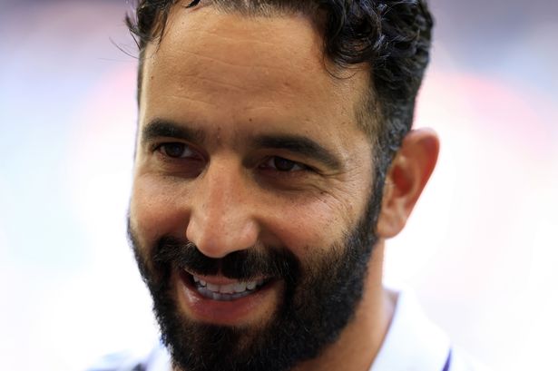 Man United boss Ruben Amorim smiles 