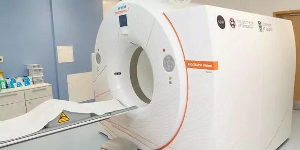 The Positron Emission Tomography (PET) scanner is pictured in situ