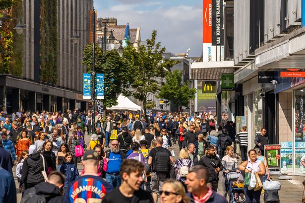 Newcastle United Kingdom Northumberland street a crowded pedestrianised street known for its shopping with many people visible