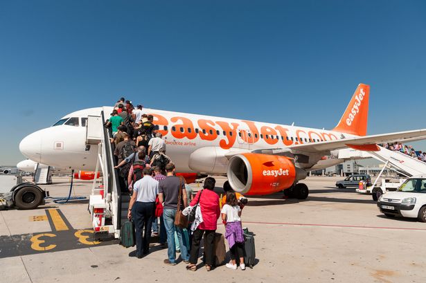 Passengers boarding Easyjet plane, Spain