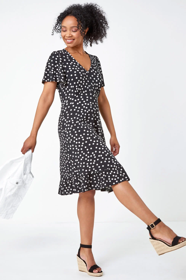 The Black Petite Polka Dot Frill Hem Stretch Dress now costs £30.40