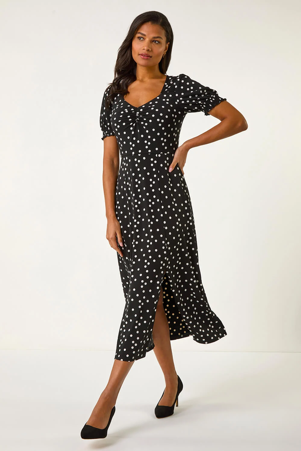 The Black Spotted Sweetheart Stretch Midi Dress now costs £33.60
