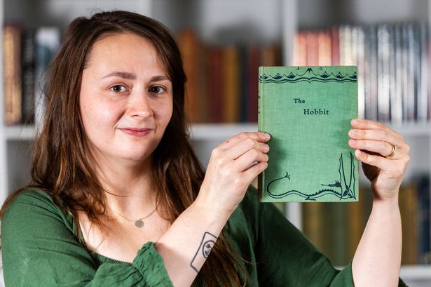 A woman holding a book