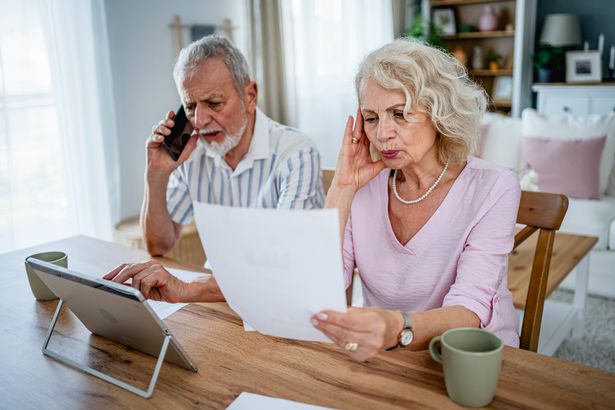 Senior couple feel distressed managing finances, paying bills and taxes