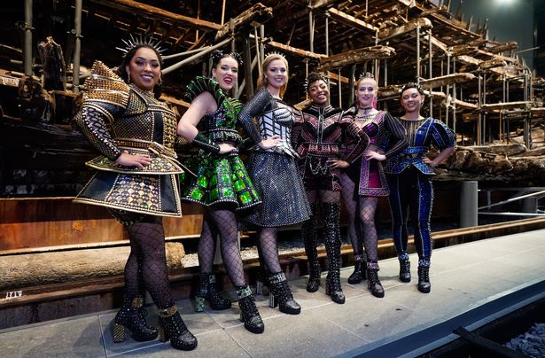 The cast of the musical Six at Henry VIII's warship, The Mary Rose, at Portsmouth Historic Dockyard.