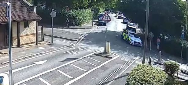 A still image from a CCTV video of the driver of a police car entering, and then exiting Morley Street in Barton Hill as the driver finds the road at the Wellspring Settlement blocked by the East Bristol Liveable Neighbourhood scheme installation