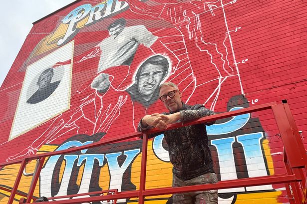 A huge mural celebrating Bristol City's history is taking shape at the entrance to the Dolman Stand at Ashton Gate, painted by Bristol street art legends Inkie and Jody (pictured with the mural nearly half completed)