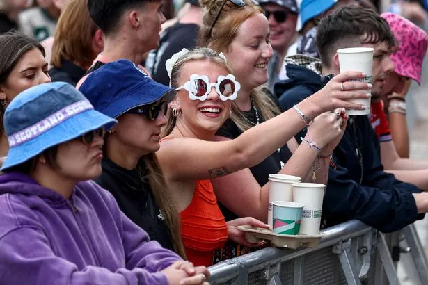 Music fans watch The Mary Wallopers performin on day two of the TRNSMT Festival 2024 at Glasgow Green on July 13, 2024 in Glasgow, Scotland