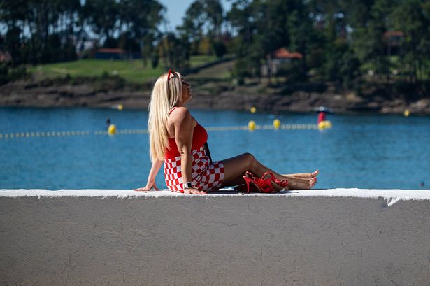 SANXENXO, PONTEVEDRA GALICIA, SPAIN - SEPTEMBER 30: A woman sunbathes on Silgar beach on September 30, 2023, in Sanxenxo, Pontevedra, Galicia, Spain. September will give way to an October immersed in an episode of heat, with a summer of San Miguel, to coincide with the holiday, temperatures reached this Saturday above normal values for the time in virtually the entire country, with 30 degrees (° C) widespread in almost all of Spain, according to the State Meteorological Agency (AEMET). (Photo By Elena Fernandez/Europa Press via Getty Images)