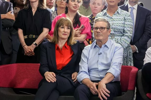 LONDON, ENGLAND - JULY 03: Britain's Chancellor of the Exchequer Rachel Reeves and Britain's Prime Minister Keir Starmer react during a visit to the Sir Ludwig Guttman Health & Wellbeing Centre on July 03, 2025 in London, England. Keir Starmer and Wes Streeting launch the government's 10-Year Health Plan, outlining how the Labour government will deliver the Plan for Change mission to rebuild the NHS through three key reform shifts: analogue to digital, hospital to community, and sickness to prevention. (Photo by Jack Hill - WPA Pool/Getty Images)