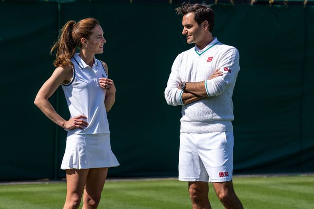 LONDON, ENGLAND - JUNE 24:  In this handout images released by Kensington Palace on June 24, 2023, Catherine, Princess of Wales and Wimbledon Champion Roger Federer talk before playing tennis on No.3 Court at The All England Lawn Tennis Club, Wimbledon, on June 8, 2023 in London, England. (Photo by Handout/Thomas Lovelock - AELTC via Getty Images)