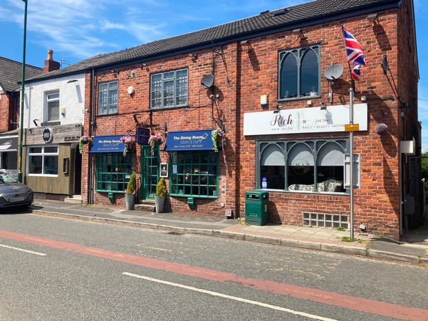 The bars, cafes and shops along Gee Cross high street in Hyde