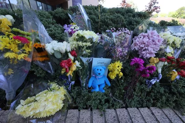 Tributes outside Gateacre School
