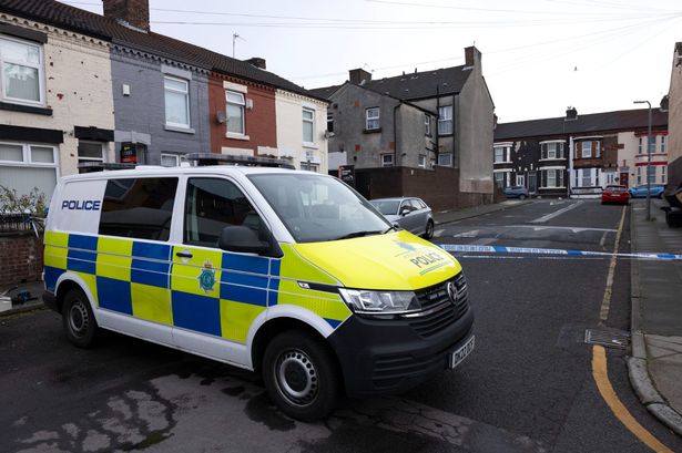 Police on Delamore Street in Walton