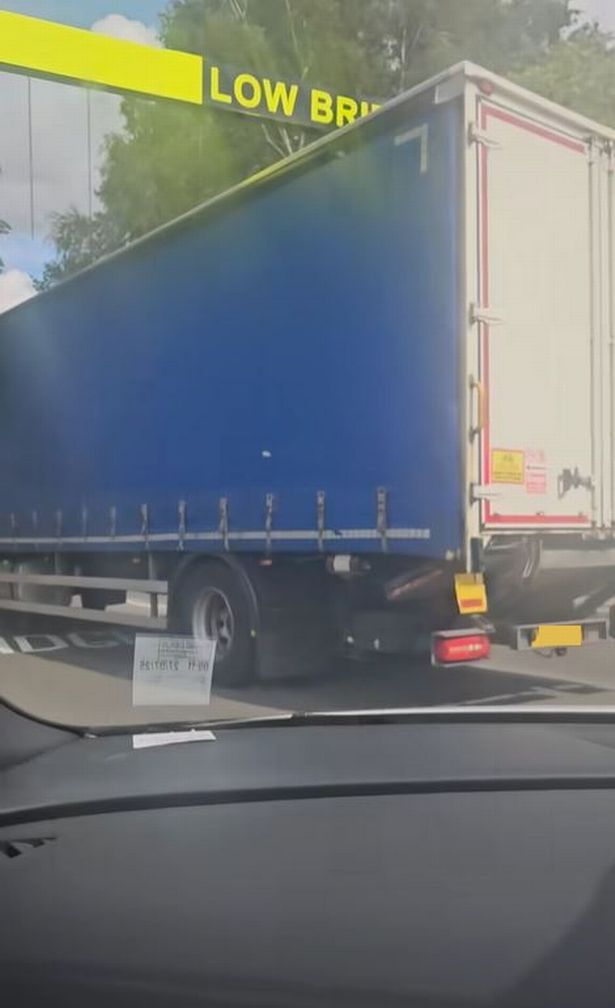 The lorry making its way backwards from the bridge