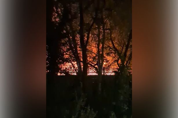 Flames soar from a fire in Swinton