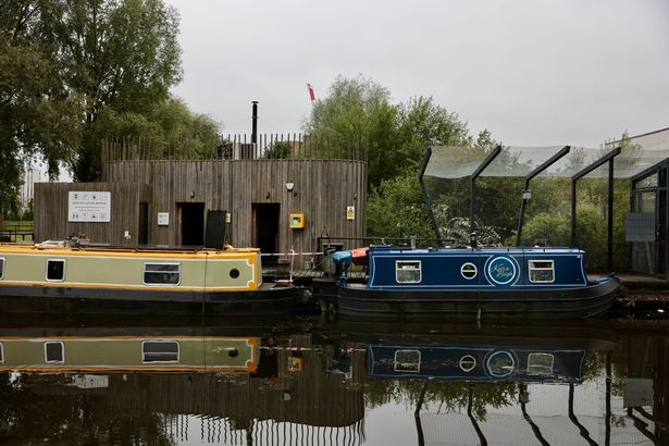 The toilet, shower and office block at New Islington marina has been taped off