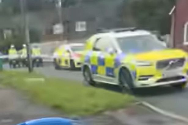 Police at the scene on Rowrah Crescent, Langley