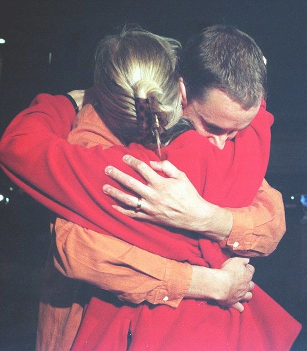Nick Dawson being consoled by wife Jules after a Crimewatch reconstruction