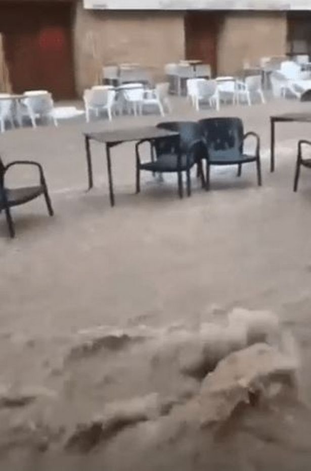 Tables and chairs outside restaurants were abandoned as the extreme weather came in