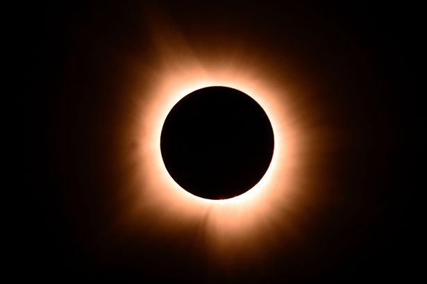 The moon eclipses the sun during a total solar eclipse across North America, in Bloomington, Indiana, on April 8, 2024.