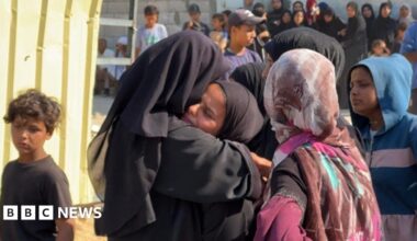 Mary Sheikh al-Eid's family is comforted after her body is brought to Nasser Hospital in Khan Younis, southern Gaza (24 July 2025)