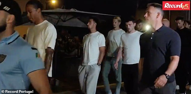 Liverpool teammates past and present flew to Portugal to pay their respects, including Virgil Van Dijk (left), Alexis Mac Allister (centre, with hands in pocket) and Andy Robertson (second from right)