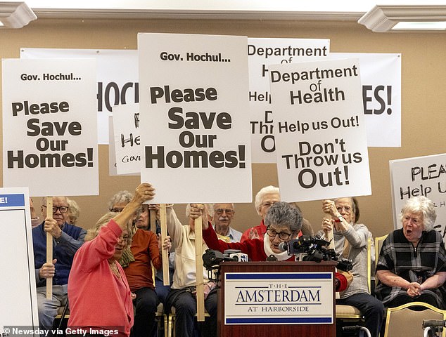 Residents organized a protest after the October bankruptcy, pleading with authorities to help them save their homes and life savings