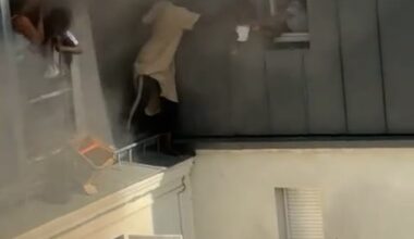 Fousseynou Cissé, 39, said he 'didn't think twice' about the danger as he stood on a ledge outside window to help those inside