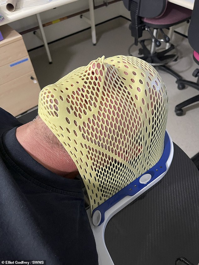 Mr Godfrey is currently nearing the end of his six-week course of radiotherapy and chemotherapy but is also tirelessly researching the next steps. Pictured, during radiotherapy treatment
