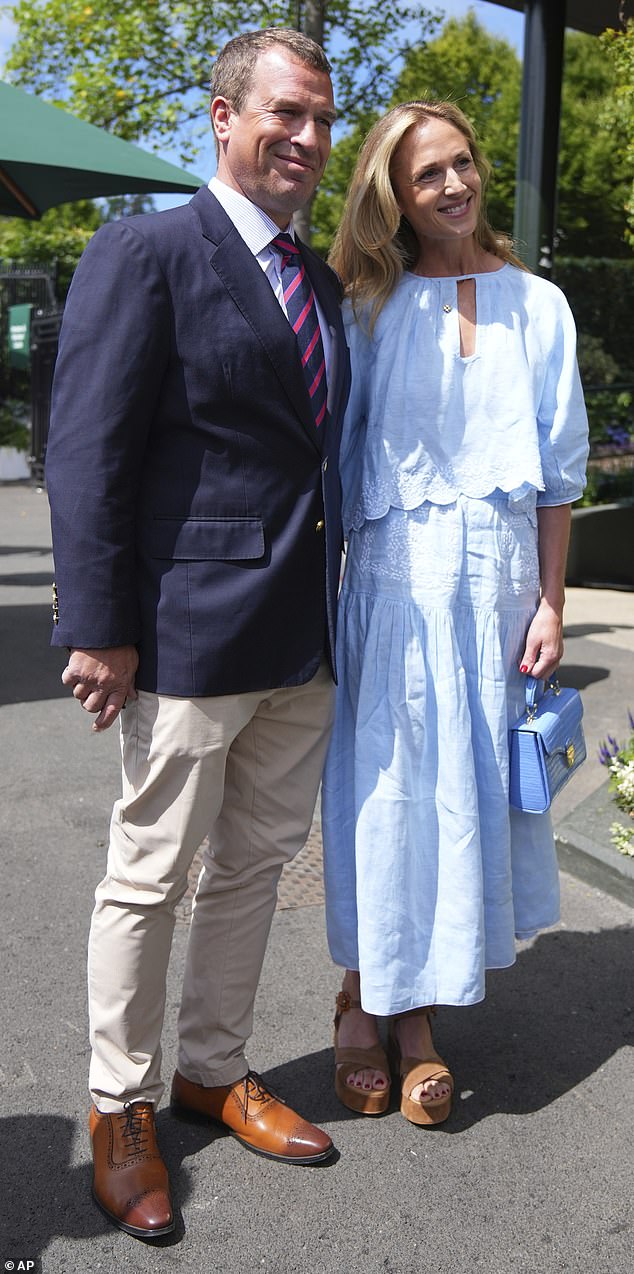 Pictured: Peter Phillips and Harriet Sperling pose for photographers as they arrive for day ten at the Wimbledon Tennis Championships in London