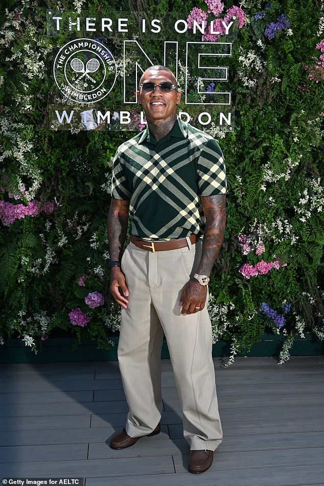 British boxer Conor Benn opted for a black plaid top and beige trousers