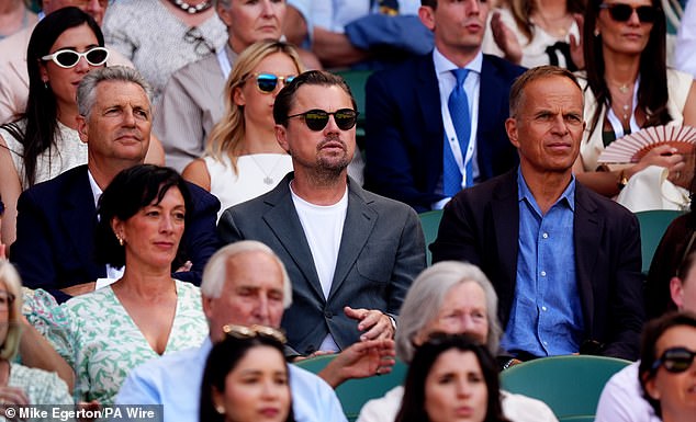 The Hollywood star opted for a simple grey blazer jacket and white T-shirt as he watched the Taylor Fritz and Carlos Alcaraz match