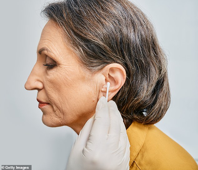 Earwax removal procedures can cost up to £100 a time privately and around one in ten people with earwax problems need this done three times a year (picture posed by model)