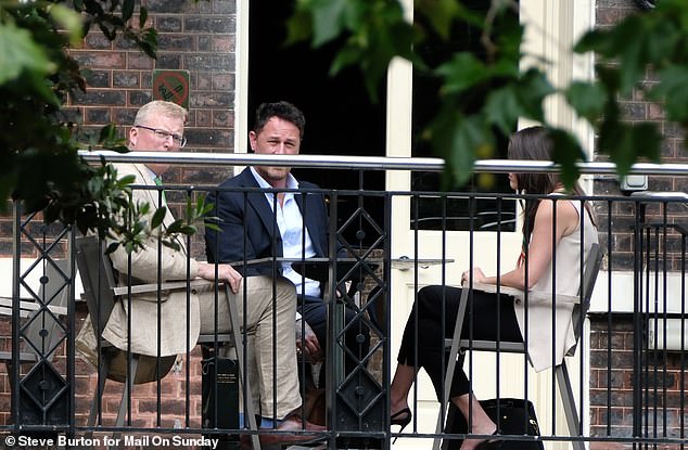The King's communications secretary, Tobyn Andreae, Harry and Meghan's chief communications officer Meredith Maines, and Liam Maguire, who runs the Sussexes' public relations team in the UK, meet at the Royal Over-Seas League for a secret peace summit