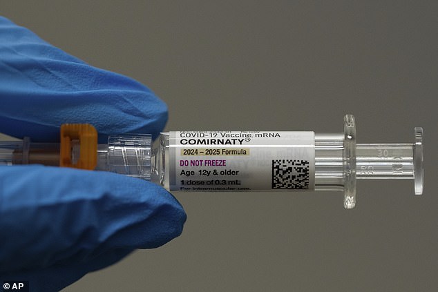 The Pfizer-BioNTech mRNA COVID-19 vaccine (pictured) has also been tied to rare inflammatory heart conditions