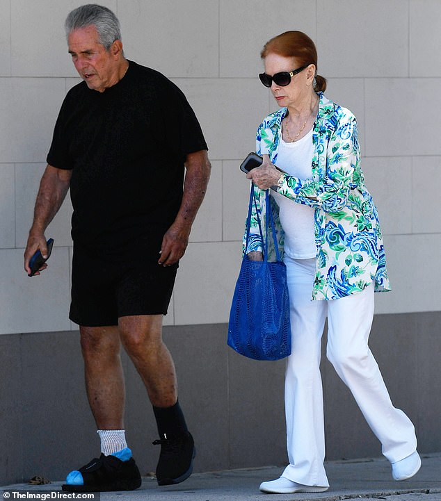 Luciana was stylish as ever this Thursday in a summery white top-trouser combo, topped with a fluttering pastel floral wrap