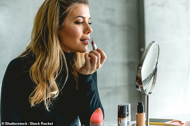 Women who used false nails, cuticle cream, blush and lipstick had a 47 per cent higher risk of being diagnosed with asthma, the study based on nearly 40,000 people found (Stock photo)