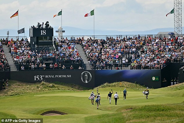 The American took off his cap and waved in turn to each side of the grandstand cheering