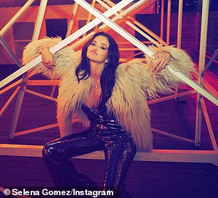 The birthday girl, who was celebrating just days ahead of her actual birthday on July 22, looked fabulous in a dark, sparkly jumpsuit with a plunging neckline