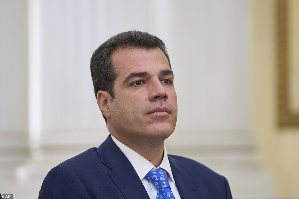 The Greek immigration minister Thanos Plevris (above) has issued a message to the millions of young men waiting in North Africa to come to his country: 'Don't come here. We will put you in jail or send you back home'
