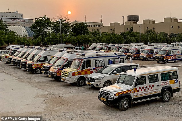 Pictured: Ambulances waiting to transfer the dead bodies of victims from the hospital complex in Ahmedabad on June 14, 2025