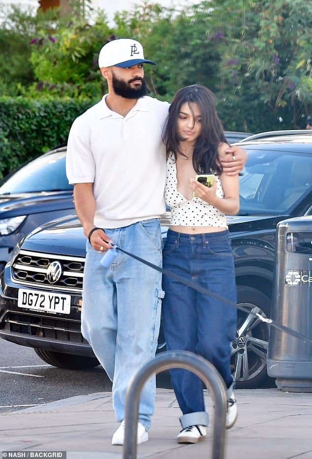 The actress, 24, looked loved-up with her new backing dancer partner, who works on her West End musical Evita, as they wondered the streets in the city