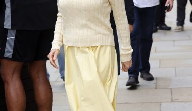 Pamela Anderson, 58, couldn't wipe the smile off her face as she departed London's Corinthia Hotel alongside Liam Neeson on Wednesday