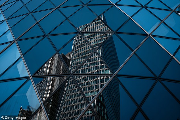 Record high: On a positive day for savers with money in shares through pensions, ISAs and other investments, the FTSE100 index rose 0.4%, or 37.68 points, to 9061.49