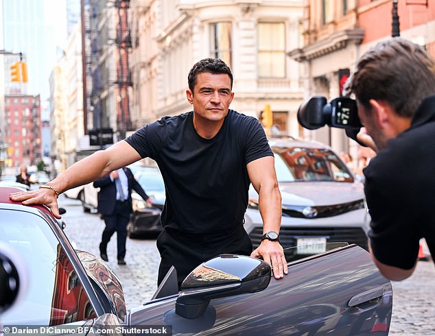Orlando seemed in good spirits for the occasion, which came a few weeks after he travelled to Venice for the Bezos wedding