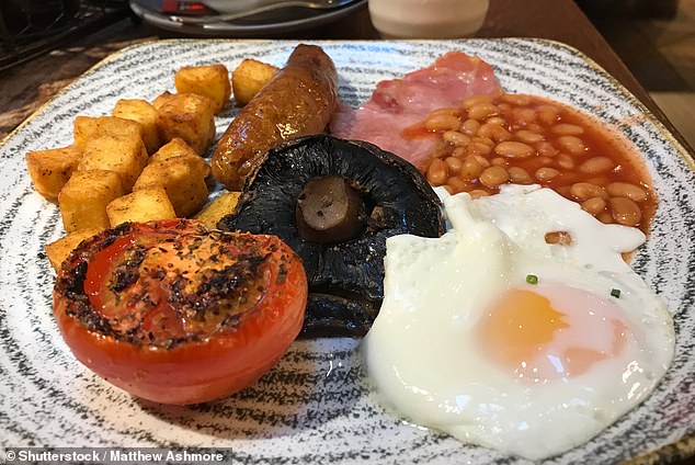 A full English breakfast has been named one of the worst 'national' meals for your health after it was revealed to have a whopping 1,279kcal (stock image)