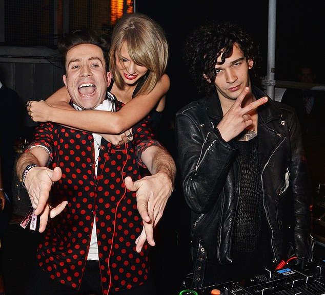 'She ¿ listen, you're not allowed to say anything, and then she writes a whole album about it,' Welch said; Swift is pictured with Nick Grimshaw (L) and Healy (R) in 2015 in London