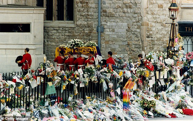 Diana's coffin enters Westminster Abbey surrounded by floral tributes. Inside the church William and Harry were joined by their father, the then Prince Charles , their grandmother Queen Elizabeth II and most of the other senior royals.